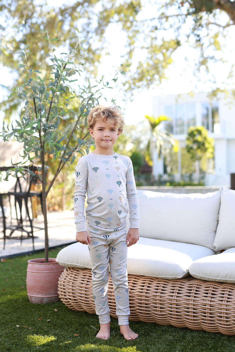 Grey Hot Air Balloon PJ sleepsuit for babies, perfect for cozy and stylish bedtime.