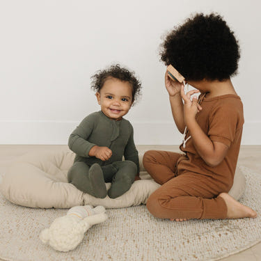 Toddler Lounger Pillow in Fawn color, perfect for cozy bedding and sleep for little ones.