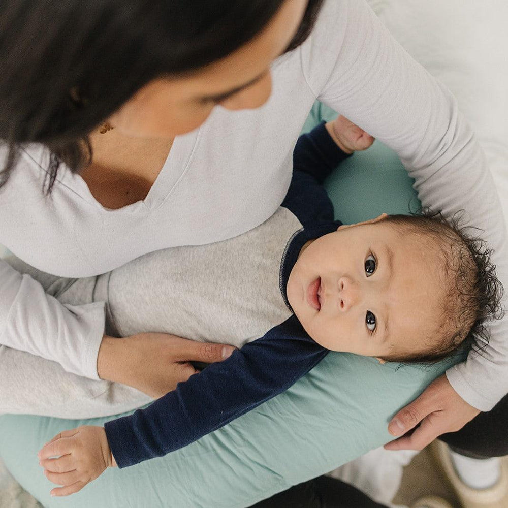 Eucalyptus nursing pillow for comfortable breastfeeding support and relaxation for moms and babies.