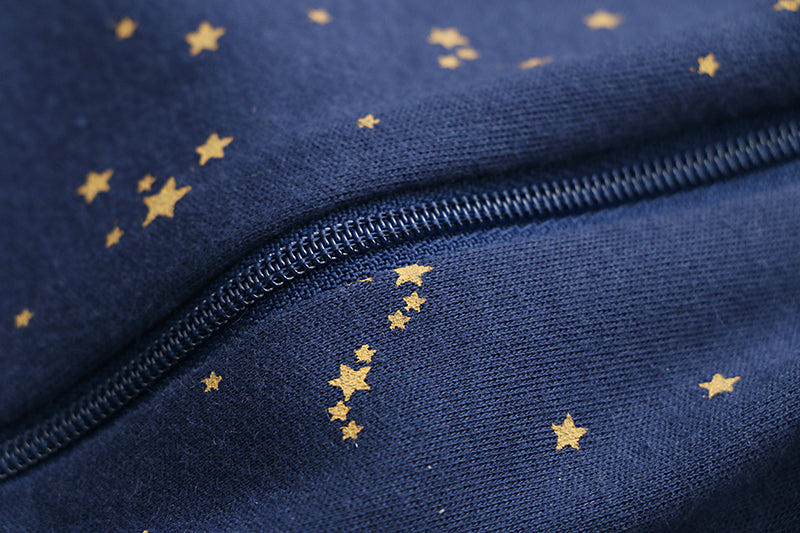 100% Organic Cotton Zip Footless Pajamas in Starry Sky design for babies, soft and breathable for comfort.