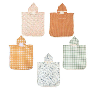 Organic cotton bathing towel poncho in fern plaid, perfect for babies after bath time.