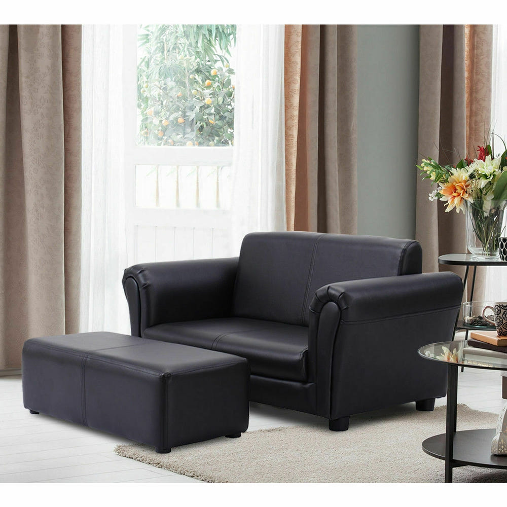 Black and white kids double sofa with ottoman, perfect for playrooms and cozy seating.