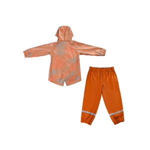 Sienna rain pants for babies, angle view showcasing waterproof design and vibrant color. Perfect for outdoor play.