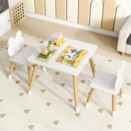 3 Pieces Kids Wooden Table and Chair Set with Cute Froggy Design in White for Playtime and Learning.