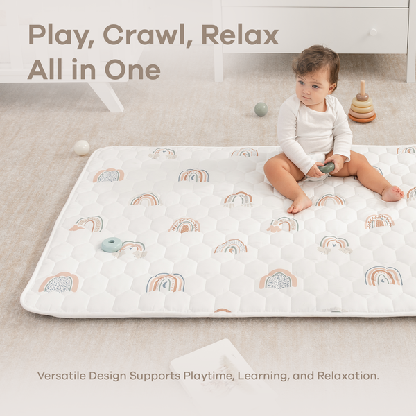 Rainbow play mat with non-slip bottom, angled view, perfect for safe and fun playtime for babies.