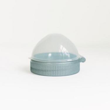 Colorful plastic ring and cap for baby cups, ensuring spill-proof drinking and easy handling for little ones.