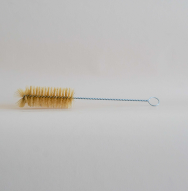 "Baby bottle cleaning brush for effective and safe bottle care and maintenance."
