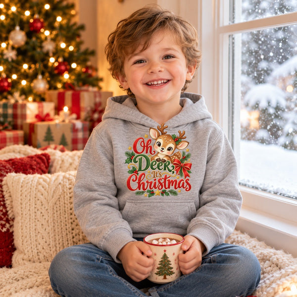 Child wearing the Oh Deer, It's Christmas toddler hoodie at Christmas