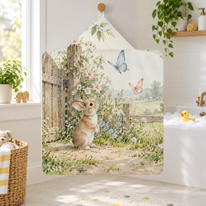 Butterfly Gate Bunny kids hooded bath towel hanging in a kids bathroom