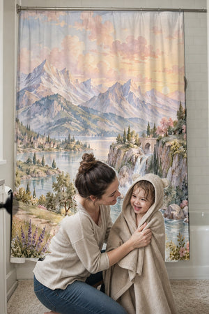 Mom drying her toddler in a hooded towel in front of the Dreamy Kingdom Fairy Tale shower curtain