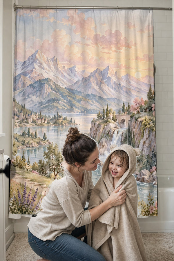 Mom drying her toddler in a hooded towel in front of the Dreamy Kingdom Fairy Tale shower curtain