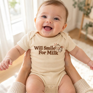 Baby wearing the Will Smile For Milk baby bodysuit
