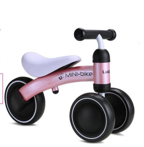 Children's twist car scooter balance walker in vibrant colors, perfect for fun and active playtime. Angle 5 view.