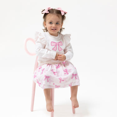 Pretty Bows Printed Bow Tutu Skirt for babies, featuring a cute design and soft fabric, perfect for special occasions.