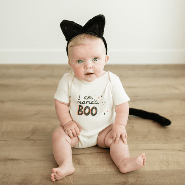 Graphic bodysuit by Mamas Boo, short sleeve, angle view showcasing cute design for babies.