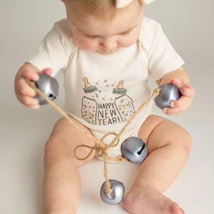 Short sleeve graphic bodysuit "Poppin Bottles" for babies, showcasing fun design from angle 2.