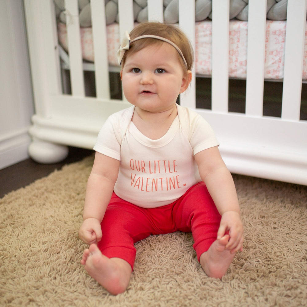 Graphic bodysuit for babies by Little Valentine, perfect for stylish and comfortable everyday wear.