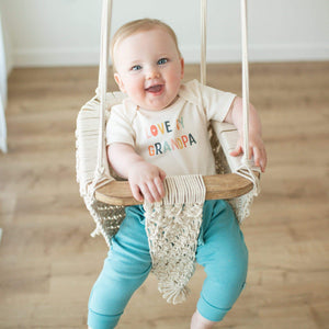 Graphic short sleeve bodysuit for babies featuring "Love Grandpa" design, shown from angle 2.