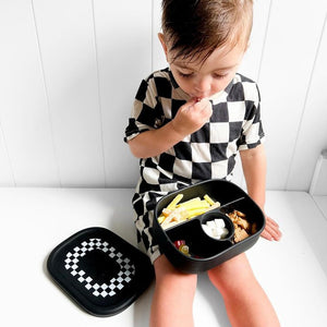 Hayden Bento Box in checkered design, perfect for baby food storage and on-the-go meals. Angle 5 view.