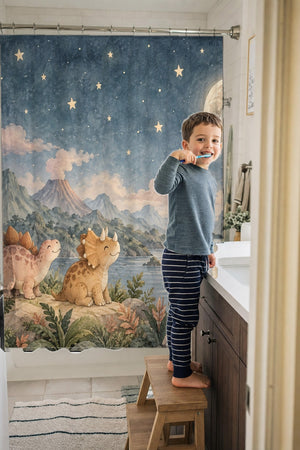 Child brushing teeth in a family bathroom with the Moonlit Dinosaurs shower curtain