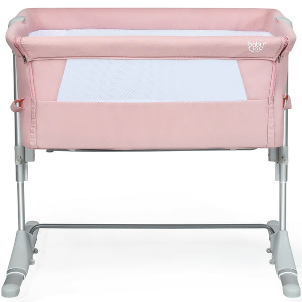 Portable baby bed side sleeper bassinet crib with carrying bag, angled view showcasing design and functionality.