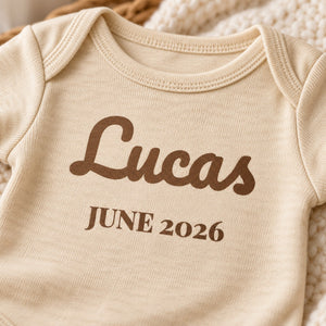 Close-up of the Name and Birth Month baby bodysuit print