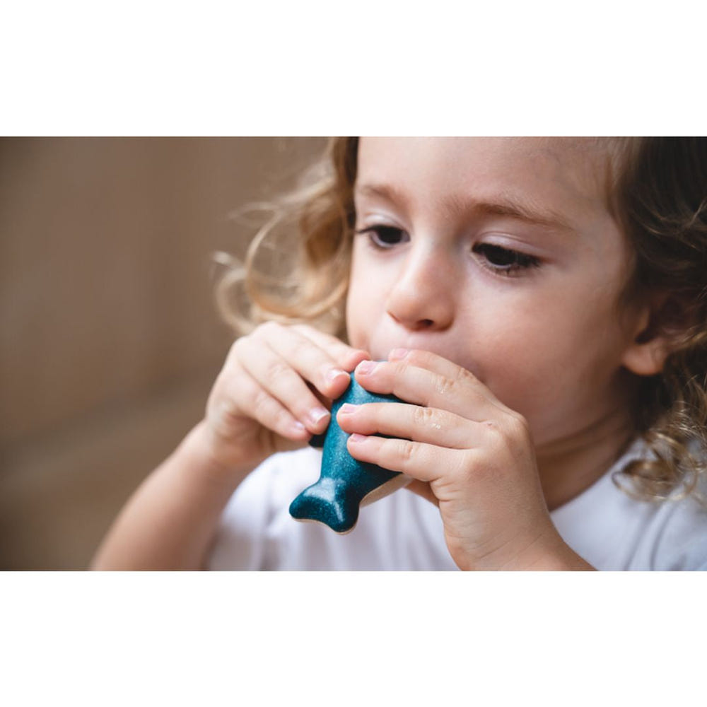 Whale Whistle toy for babies, perfect for entertainment and sensory play.