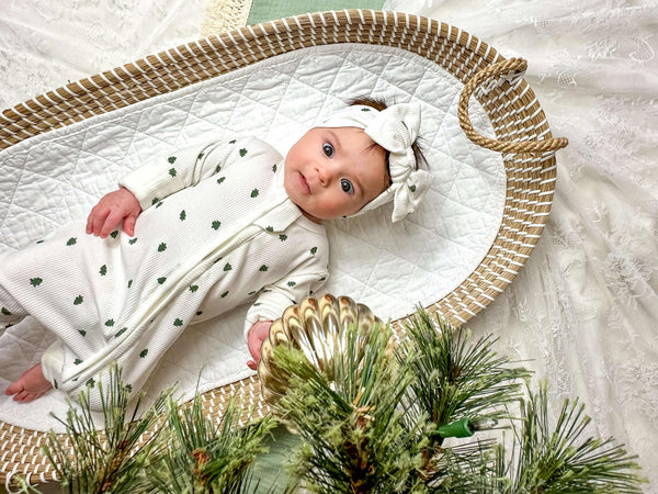 Tiny Trees Ribbed Bamboo Zippy Pajamas for babies, soft and cozy sleepwear in a stylish angle view.