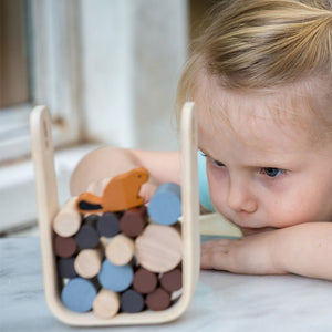 Timber Tumble toy for babies, showcasing vibrant colors and engaging design from angle 3. Perfect for playtime fun!