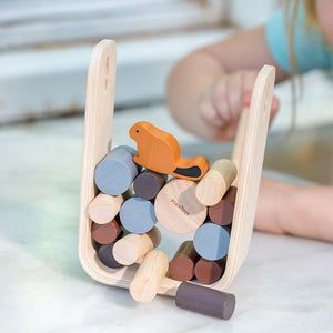 Timber Tumble baby toy in vibrant colors, promoting fun and development, showcased from angle 6.