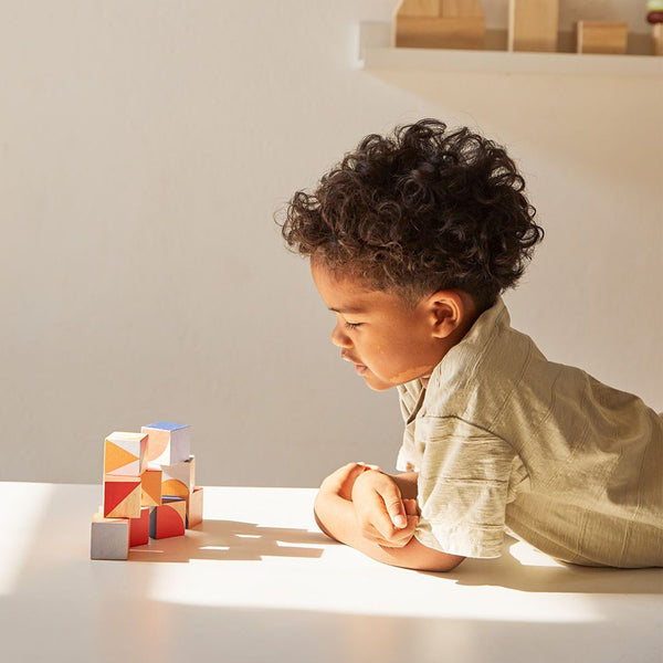 Colorful Geo Pattern Cubes for babies, promoting creativity and learning through fun puzzles and activities.