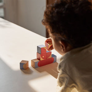 Colorful Geo Pattern Cubes for babies, promoting creativity and cognitive skills through fun puzzle play.