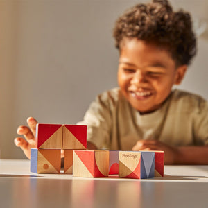 Colorful Geo Pattern Cubes for babies, promoting creativity and cognitive skills through fun puzzles and activities.