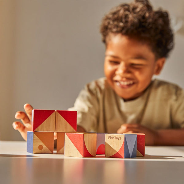 Colorful Geo Pattern Cubes for babies, promoting creativity and cognitive skills through fun puzzles and activities.