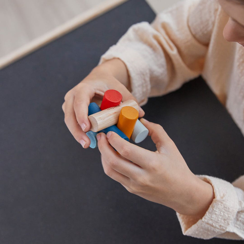Log Puzzle - PlanMini: Colorful wooden baby puzzle for early learning and play, perfect for nursery decor.