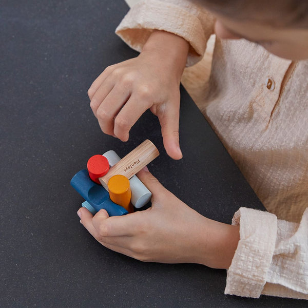 Log Puzzle - PlanMini furniture for babies, showcasing a colorful wooden design from angle 3.