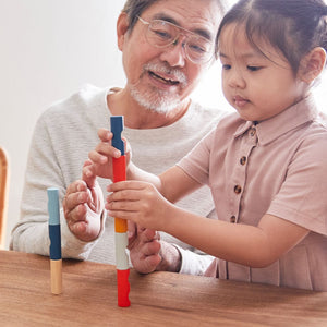 Colorful Log Puzzle from PlanMini, designed for babies, showcasing furniture for playful learning at angle 5.
