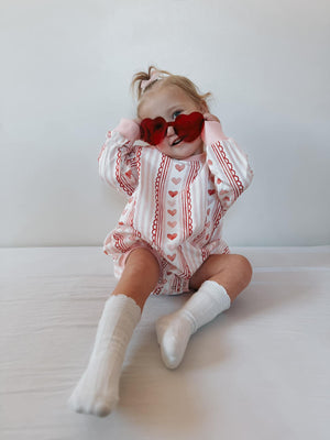 Laced with Love Sweatshirt Romper for babies, stylish and cozy, shown from angle 3. Perfect for playful outings!