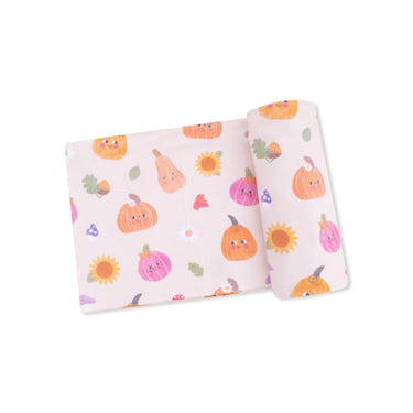 Pink Autumn Pumpkins swaddle blanket for babies, perfect for cozying up in style.