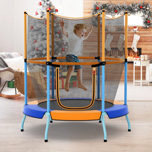 Child playing on a trampoline with safety net in a decorated living room.