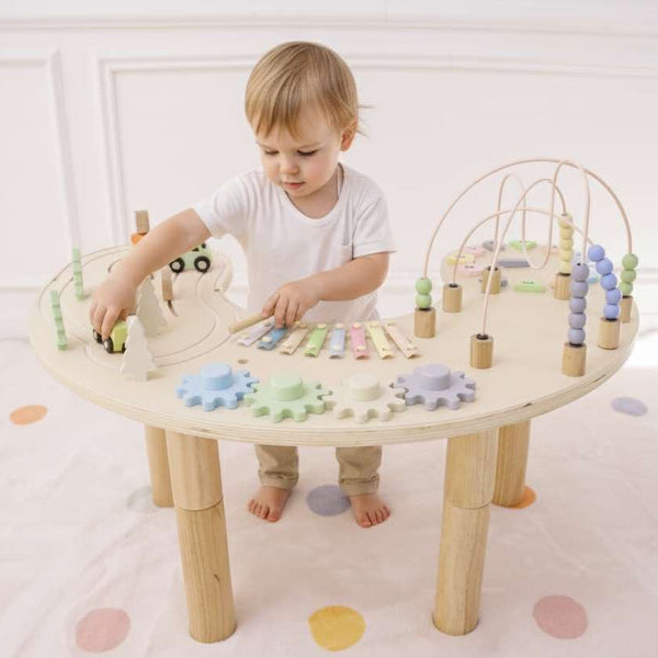 Wooden multi-activity sensory play table for babies, showcasing engaging features from angle 2.