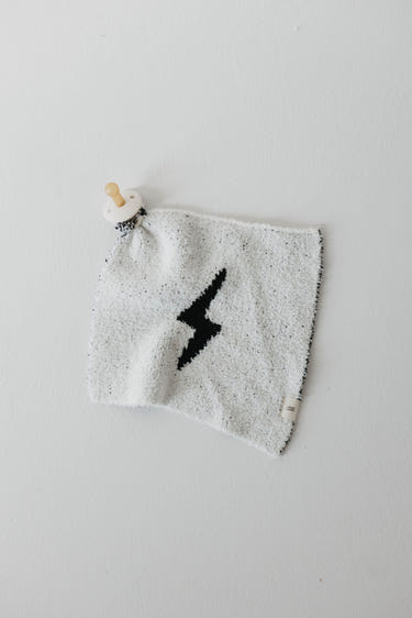 White and black lightning bolt lovey for babies, perfect for comfort and cuddling.