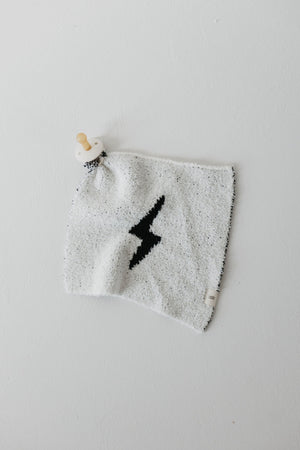 White and black lightning bolt lovey for babies, perfect for comfort and cuddling.