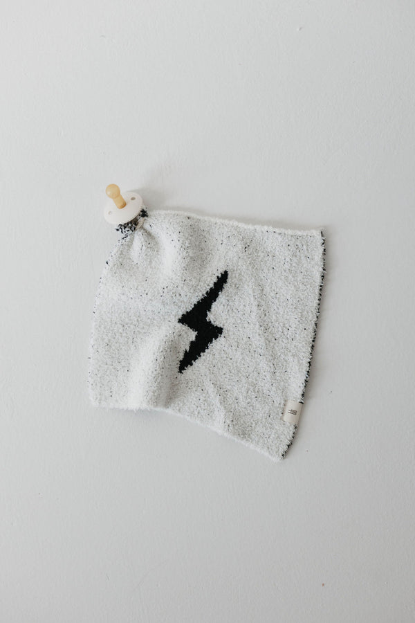 White and black lightning bolt lovey for babies, perfect for comfort and cuddling.