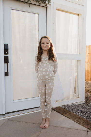Bamboo two-piece pajamas for babies by Lazy Daisy, soft and breathable for comfortable sleep.