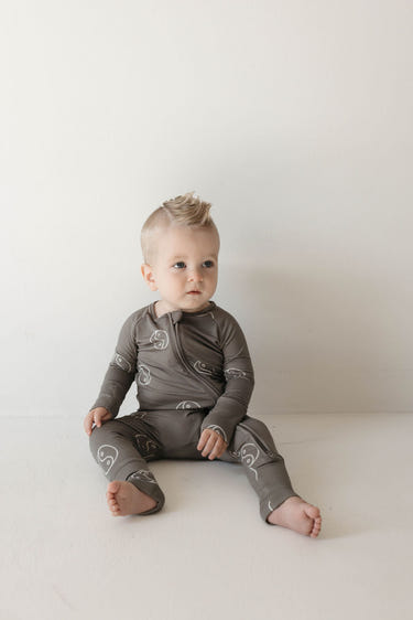 Bamboo Zip Pajamas in Sage Yin Yang for babies, soft and stylish sleepwear for comfort and warmth.