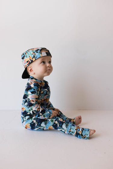 Bamboo zip pajamas in Charli print for babies, soft and stylish sleepwear for comfort and ease.