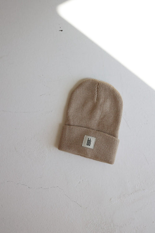 Taupe ff Knit Beanie for babies - stylish and cozy headwear for little ones.