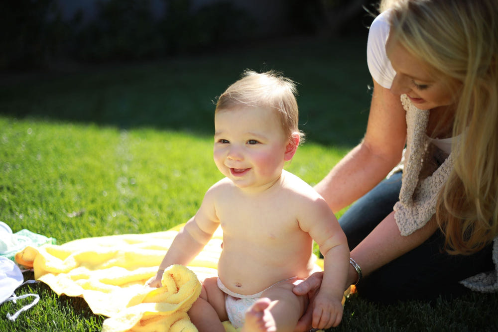 Ultimate Beach Towel Blanket with Zipper Compartment for babies, perfect for beach days and outdoor adventures.