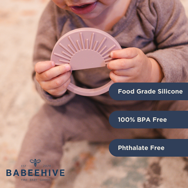 Sage Sunburst Teething Toy at angle 3, perfect for soothing baby's gums and promoting sensory development.